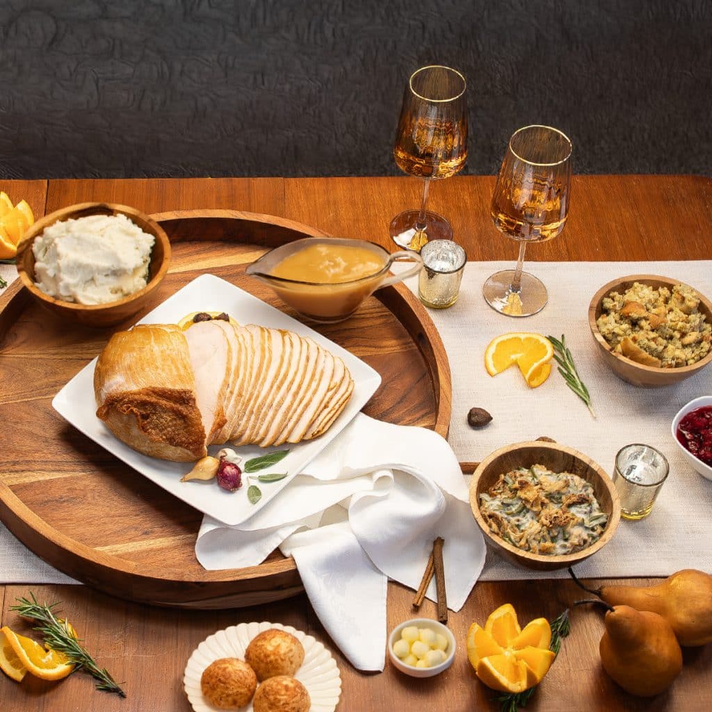 Graphic of trukey breast and sides on a table