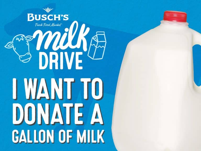 Bright blue poster with a milk carton and cow drawing. Text reads, "Busch's Milk Drive: I want to donate a gallon of milk," alongside a gallon jug.