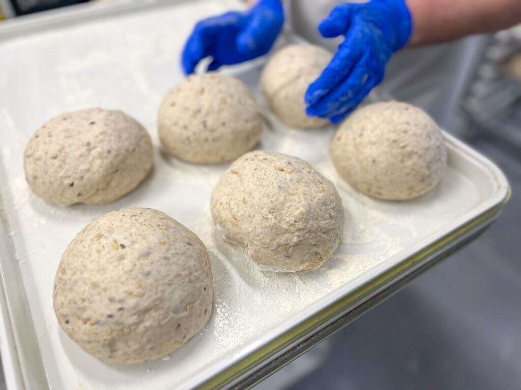 Loaves of bread being prepared for baking in Michigan