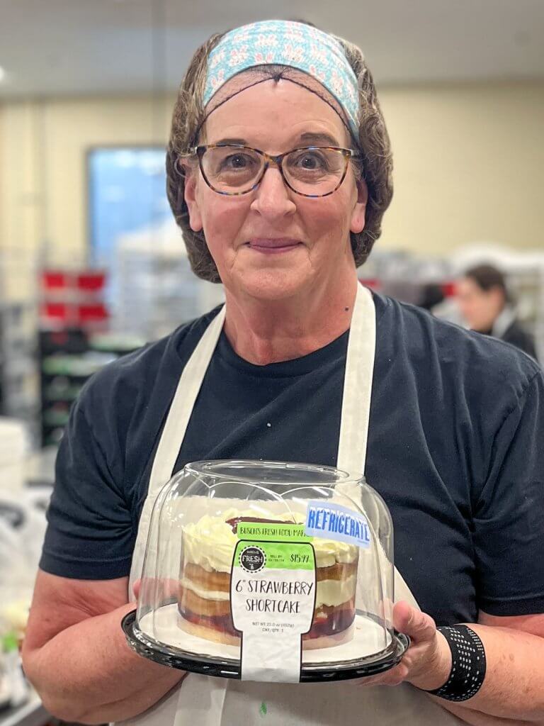 A Woman Holding a Strawberry Shortcake She Made in a Baking Competition in Ann Arbor, Michigan