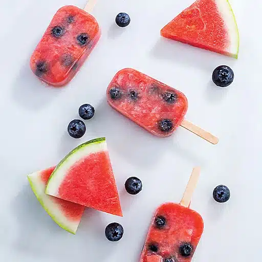 Homemade watermelon and blueberry frozen popsicles